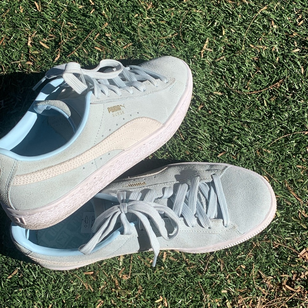 Baby blue suede Puma sneakers